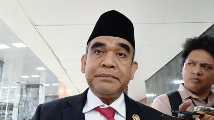 usia pensiun